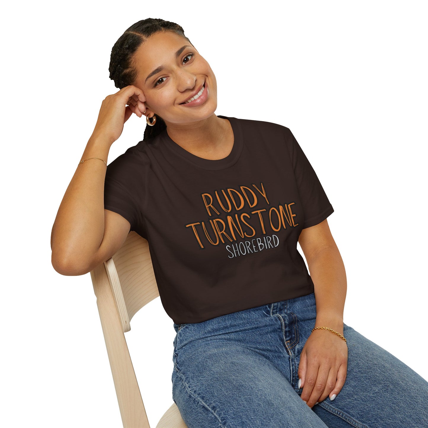 Girl wearing brown t-shirt with 'Ruddy Turnstone Shorebird' text on a white background
