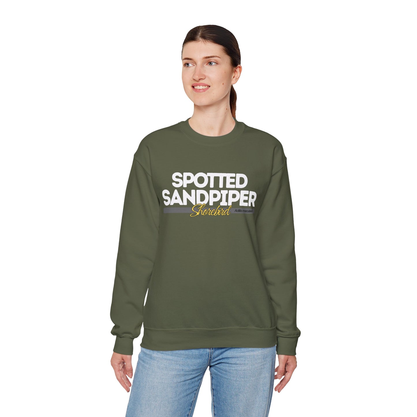 Person wearing a military green sweatshirt with 'Spotted Sandpiper' text on a white background