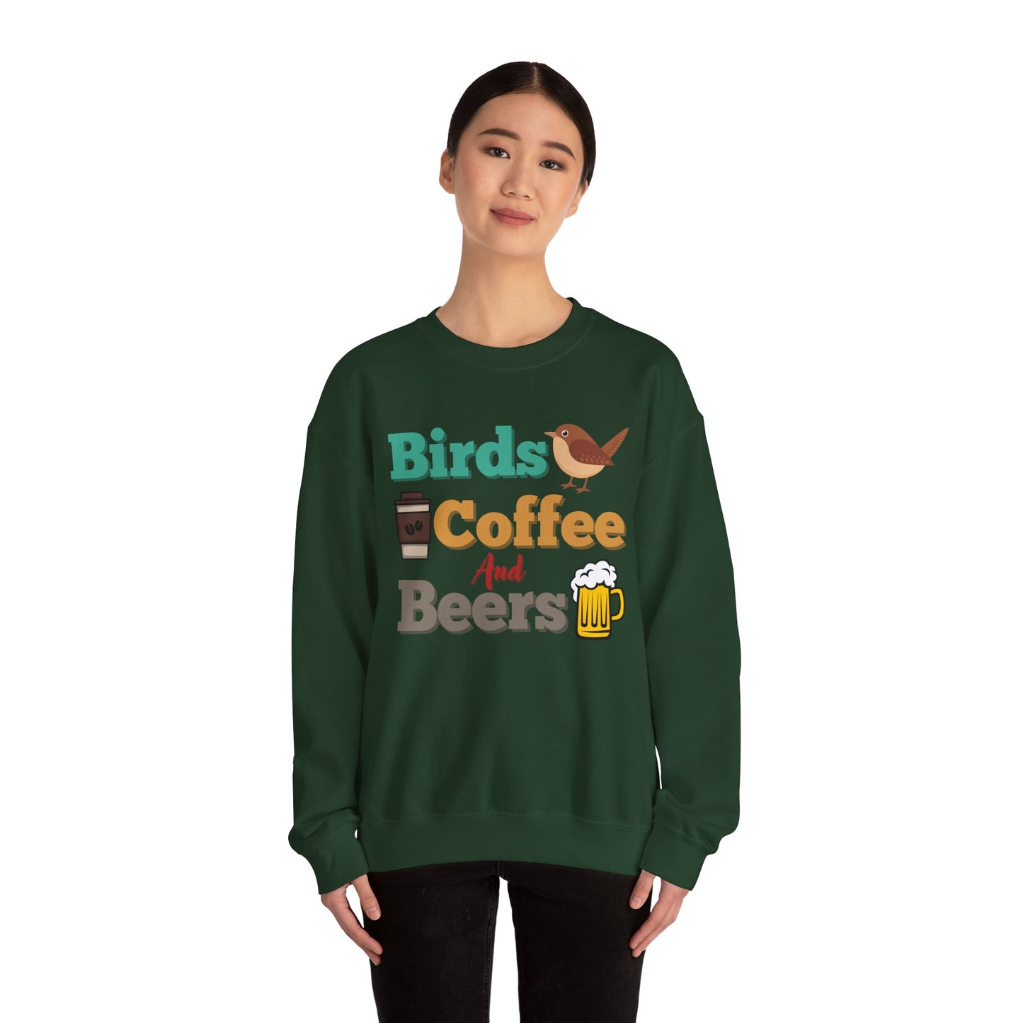 Person wearing green sweatshirt with colorful "bird, coffee, beers" text and graphics on a white background