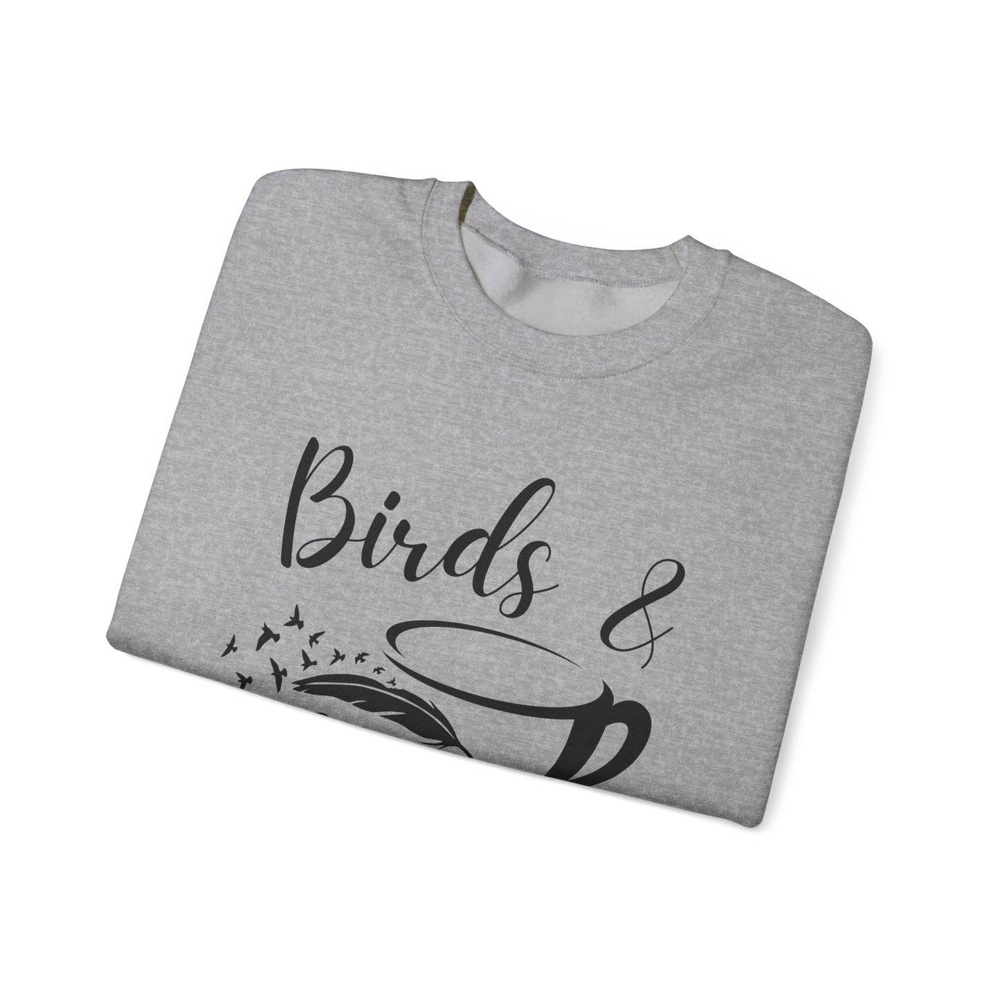 Folded gray sweatshirt with 'Birds & Coffee' text on a white background
