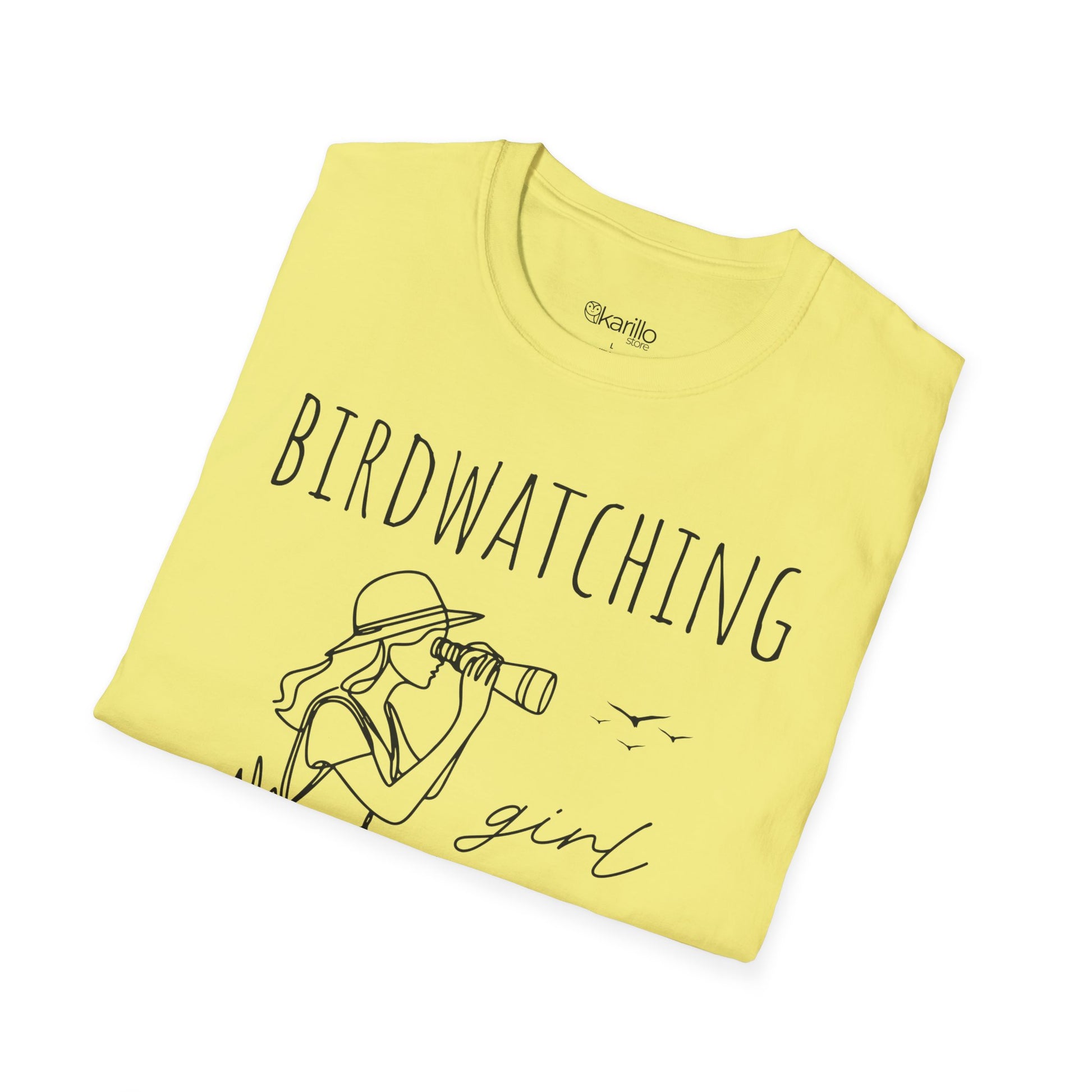 Close view of a "Birdwatching Girl" T-shirt with an outlined graphic of a girl spotting a bird using binoculars