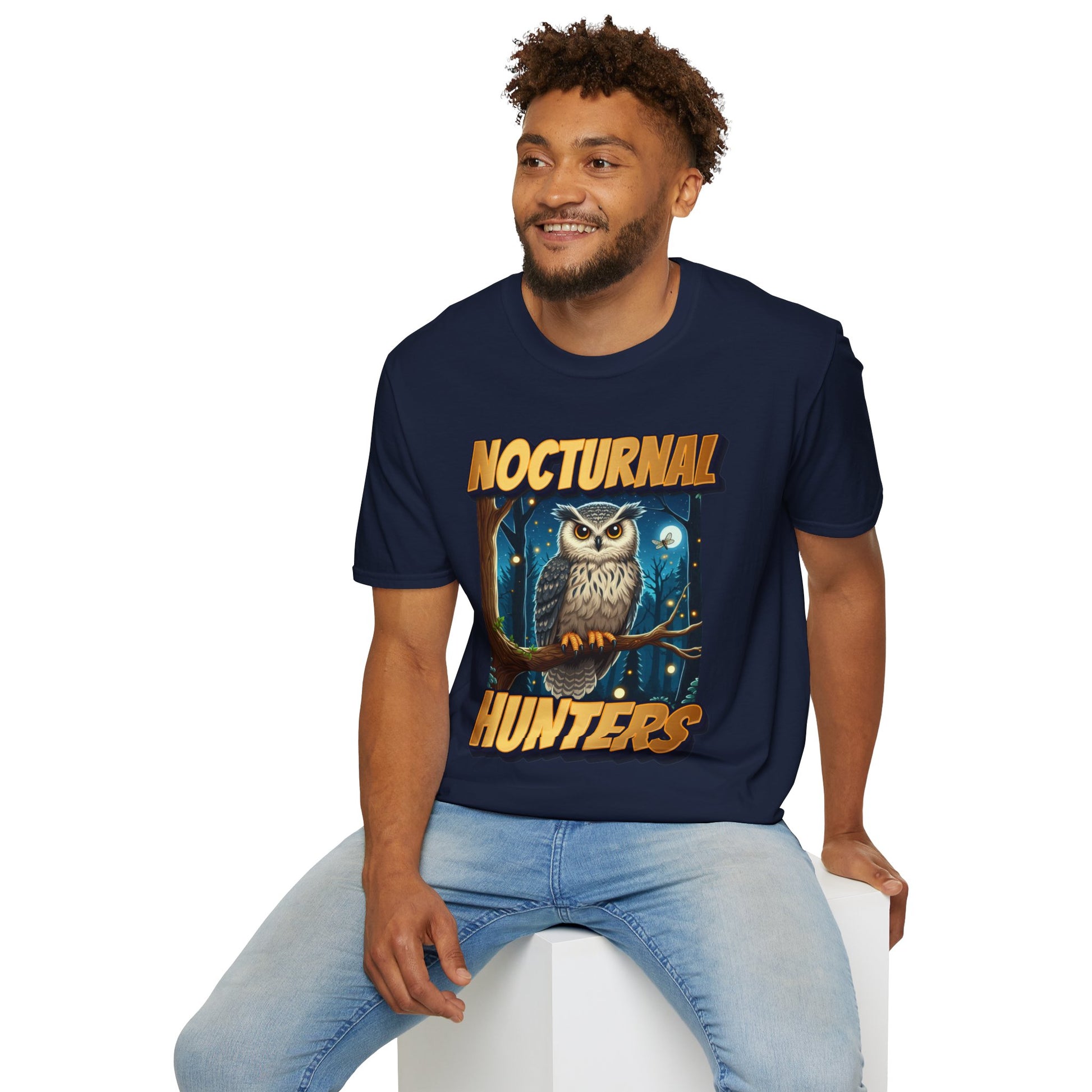 man wearing navy blue t-shirt with 'nocturnal hunters' text on a white background