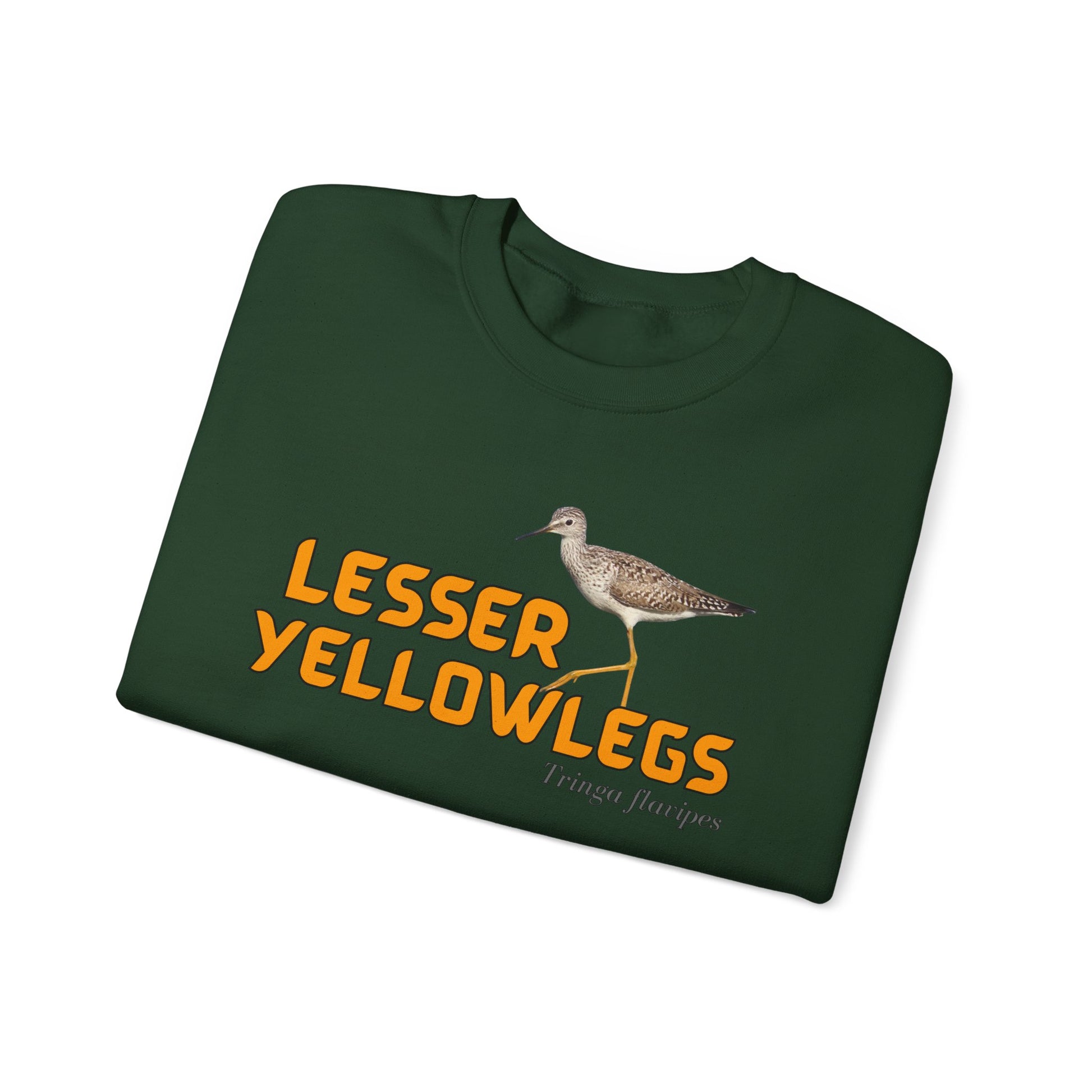 Folded green shirt with 'Lesser Yellowlegs' text and bird illustration on a white background