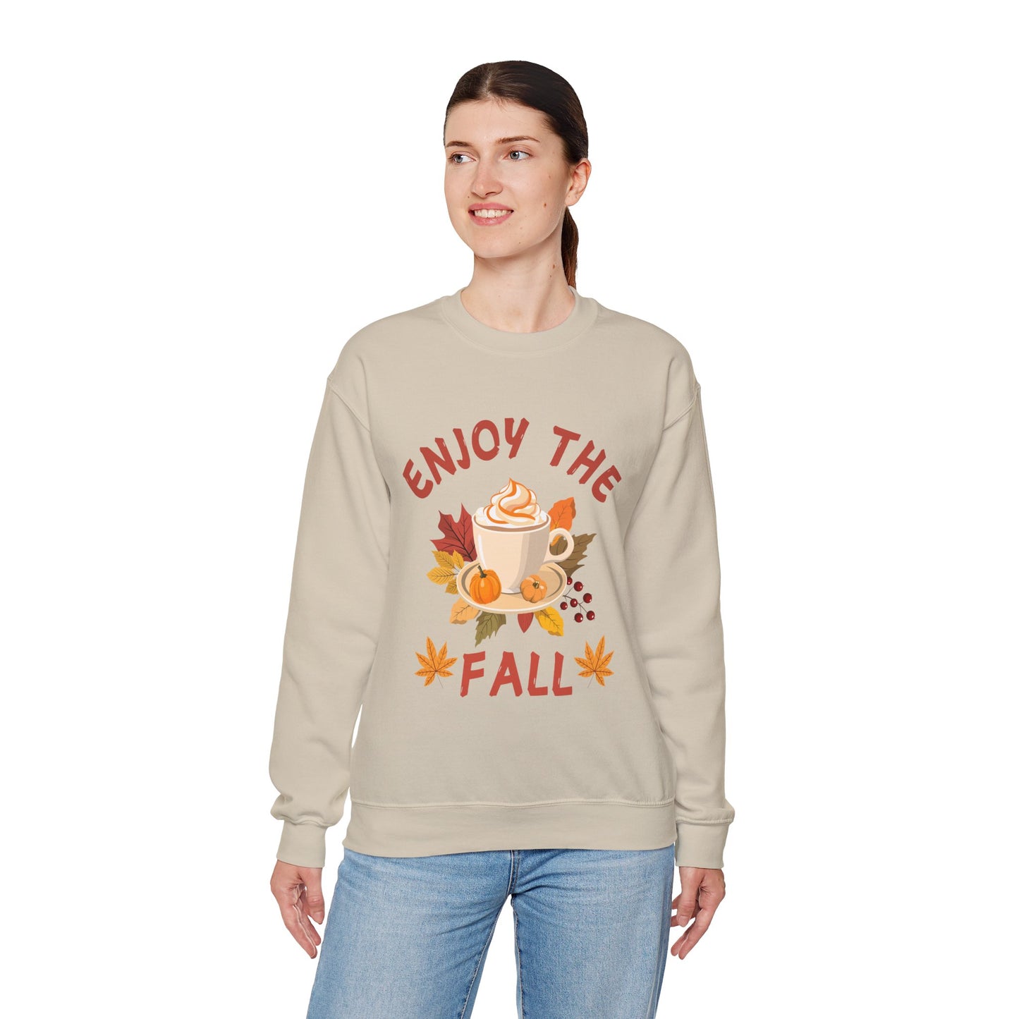 Woman wearing a beige sweatshirt with 'Enjoy the Fall' text and autumn-themed graphics on a white background