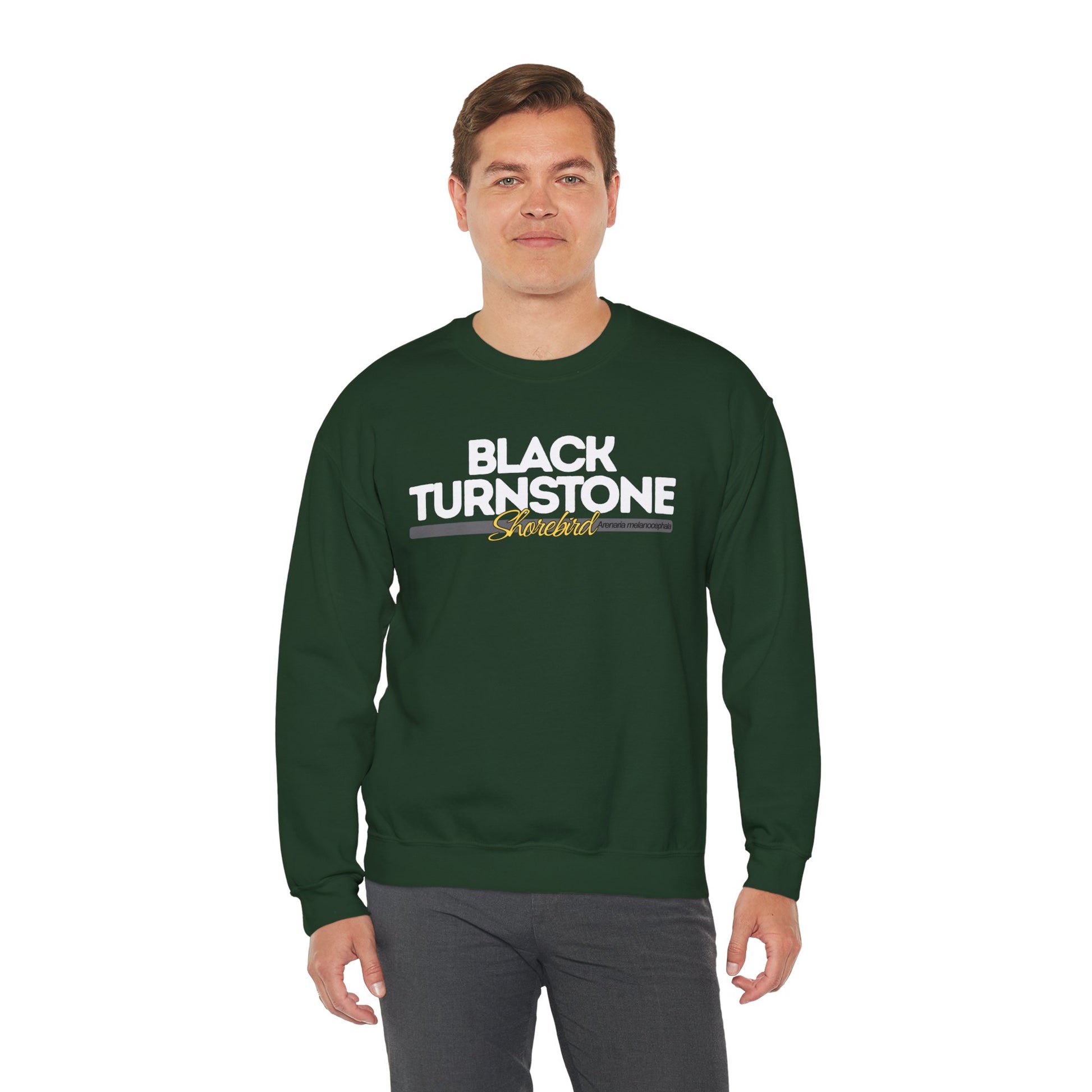 Man wearing a green sweatshirt with 'Black Turnstone' text on a white background