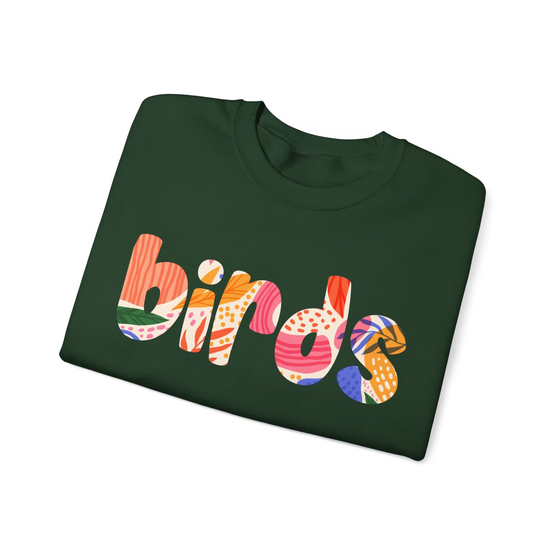 Folded green sweatshirt with colorful 'birds' text on a white background
