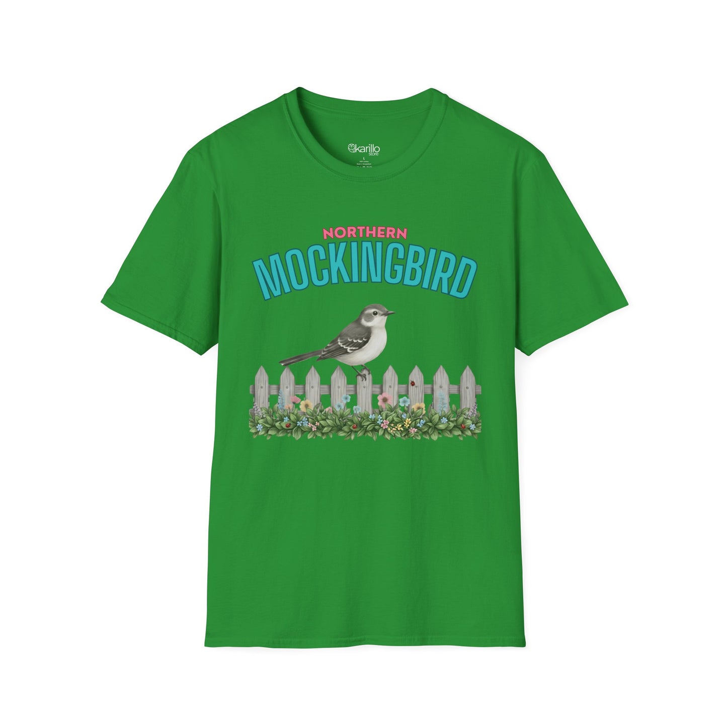 A green t-shirt with a graphic print featuring the text 'NORTHERN MOCKINGBIRD' in teal and pink, an illustration of a mockingbird perched on a white picket fence with green foliage, with white background.