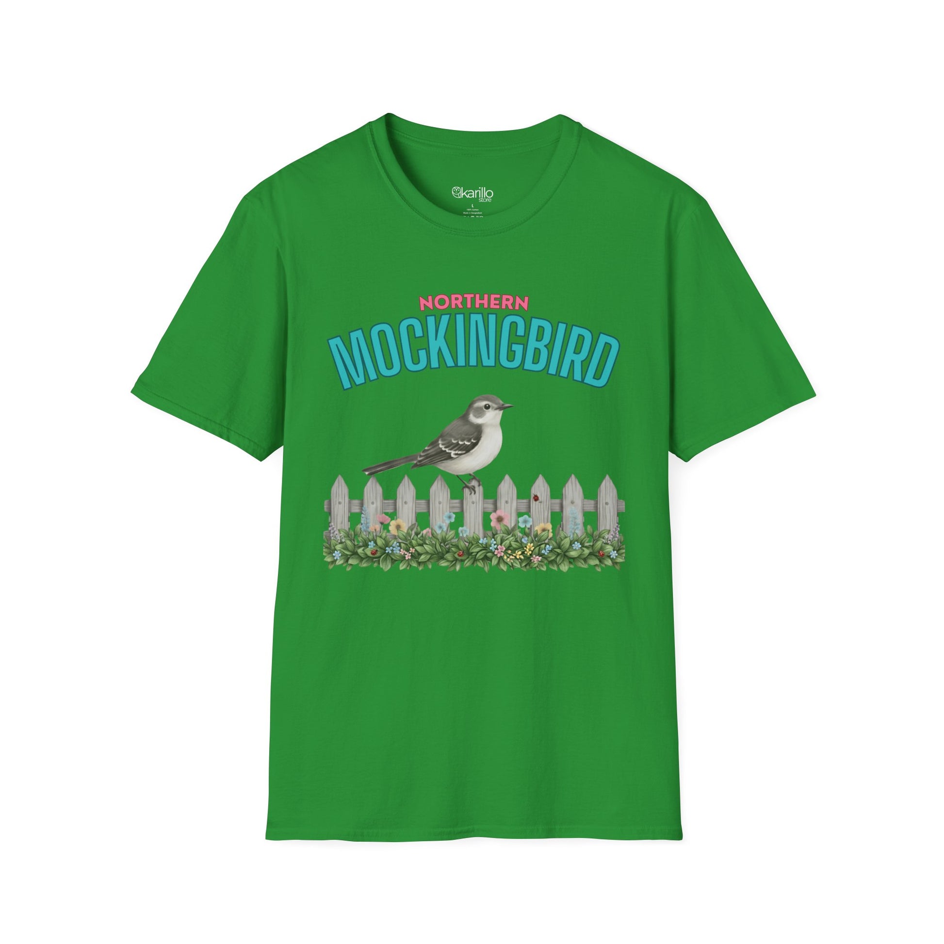 A green t-shirt with a graphic print featuring the text 'NORTHERN MOCKINGBIRD' in teal and pink, an illustration of a mockingbird perched on a white picket fence with green foliage, with white background.