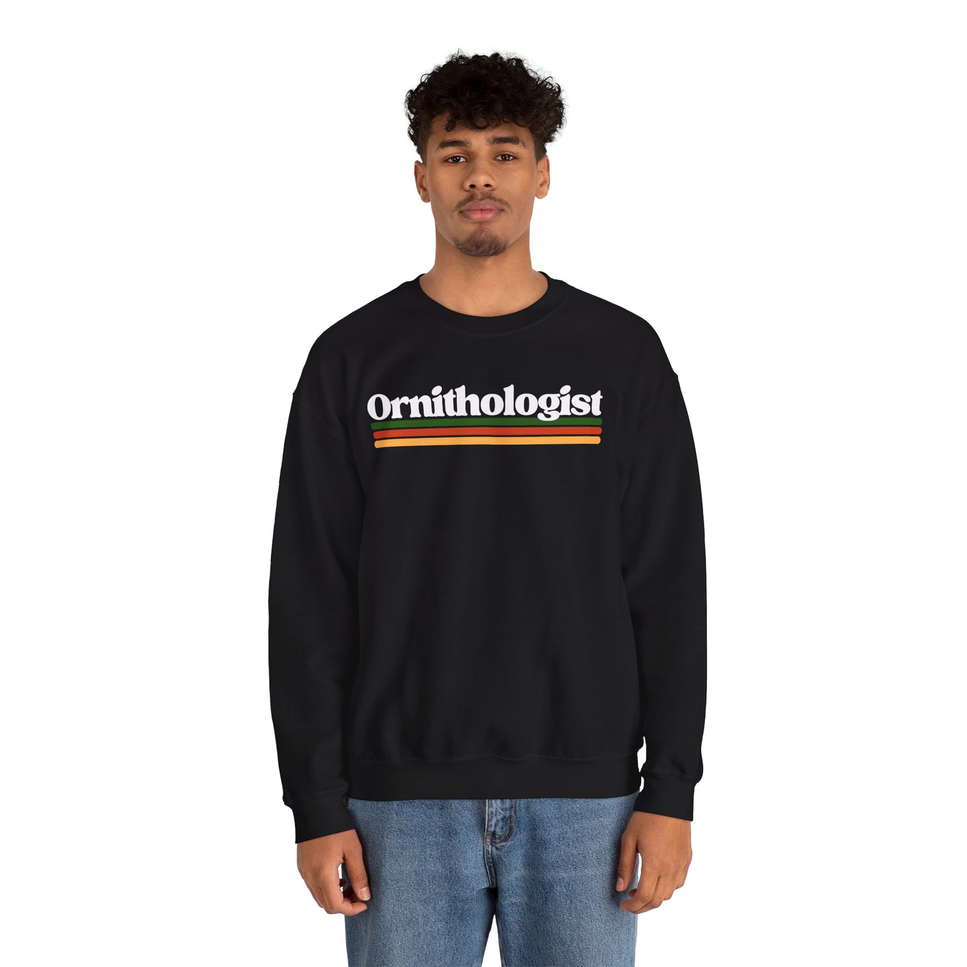 Person wearing a black sweatshirt with 'Ornithologist' text on a white background