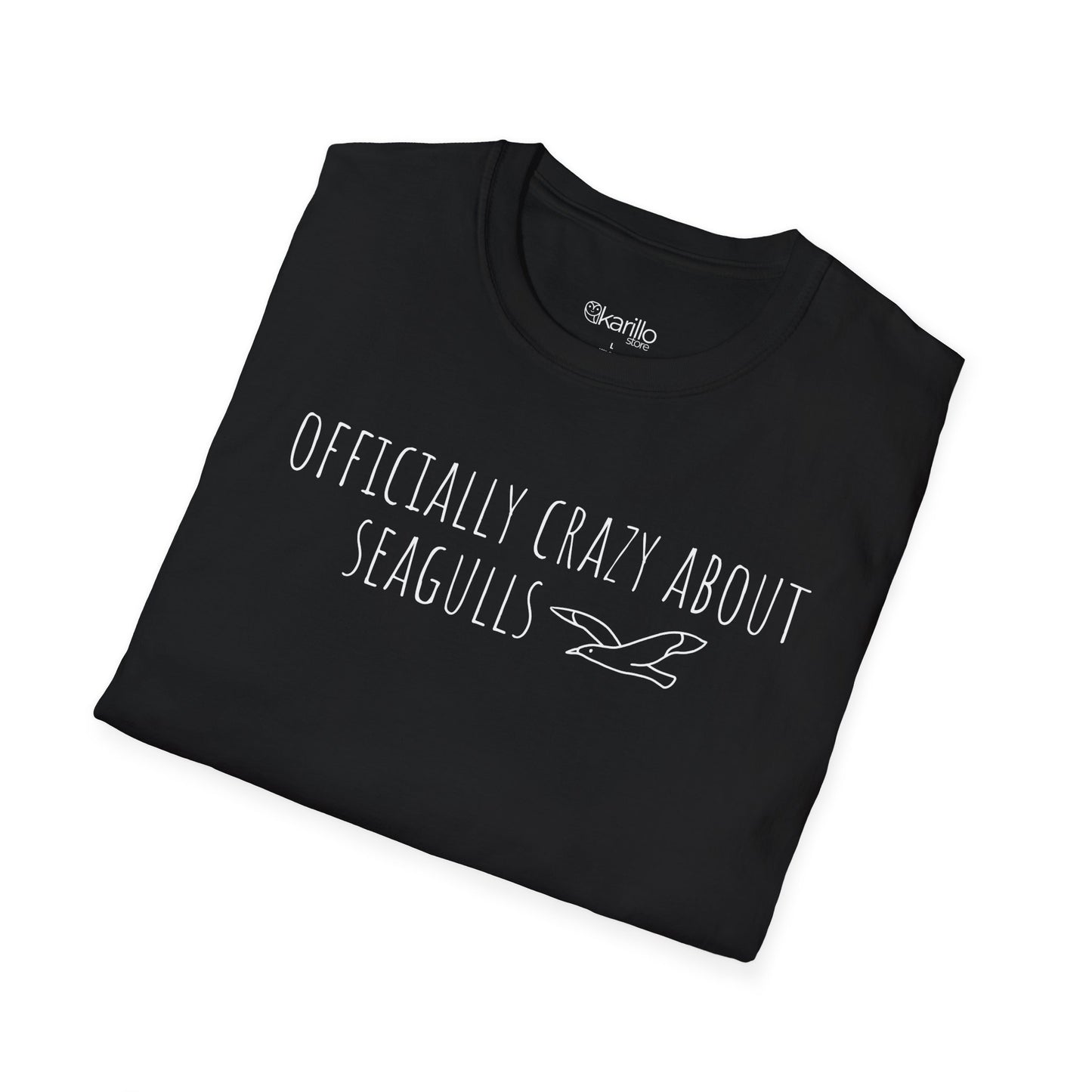 Folded Black t-shirt with text 'Officially crazy about seagulls' on a white background