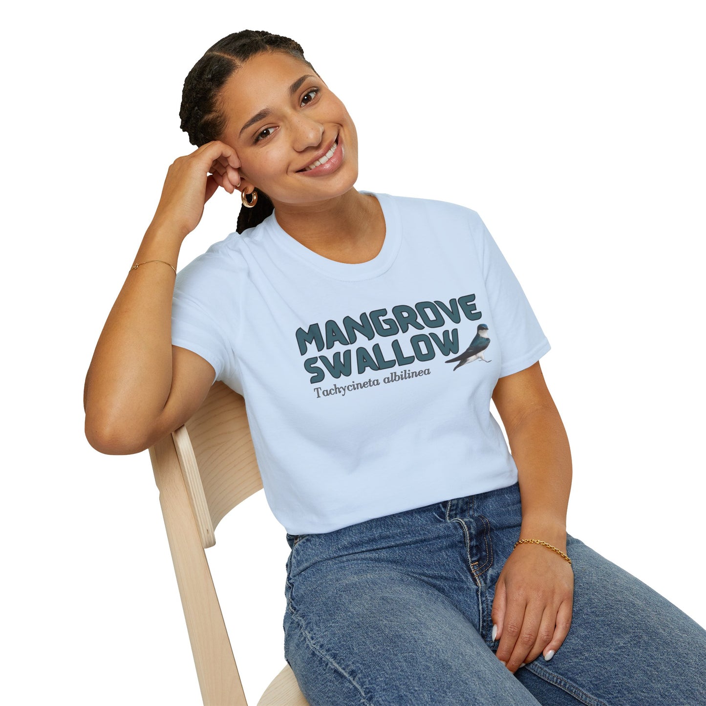 Girl wearing light blue t-shirt with 'Mangrove Swallow' text and bird graphic on a white background