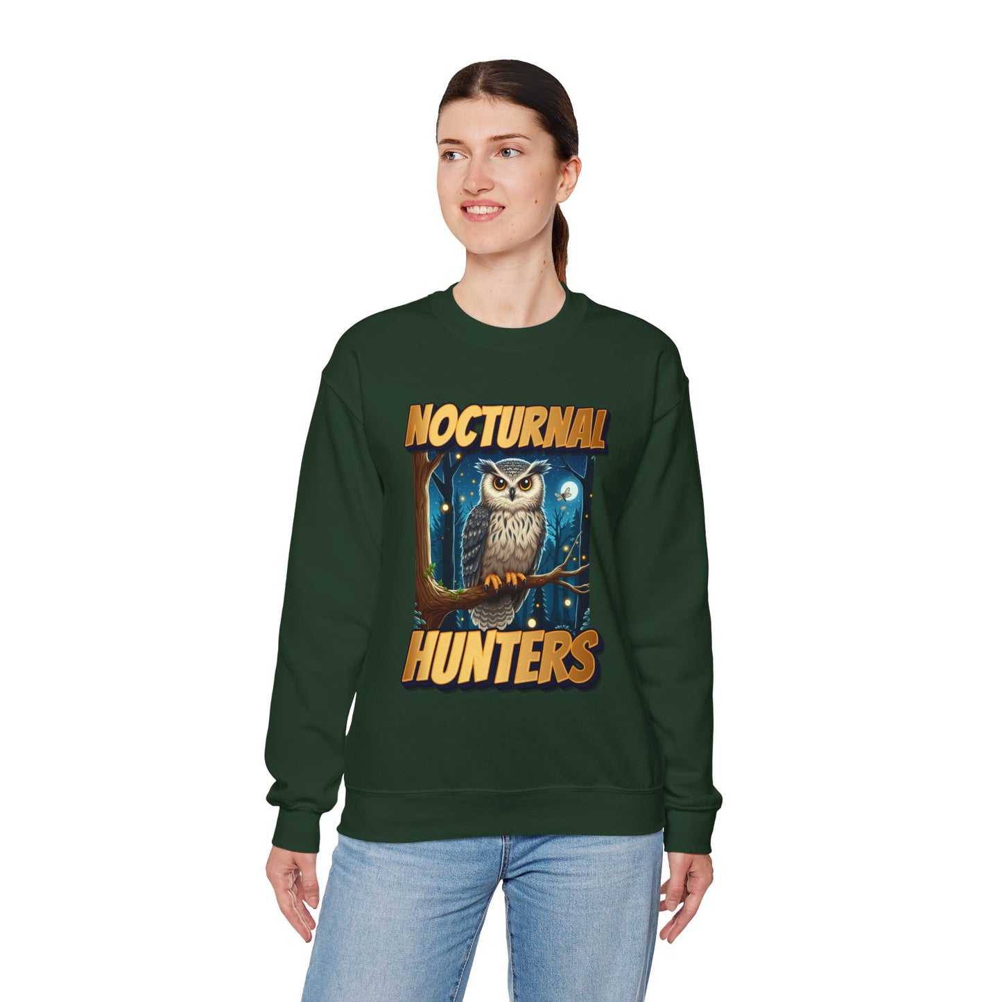 Person wearing a green sweatshirt with an owl graphic and 'Nocturnal Hunters' text on a white background