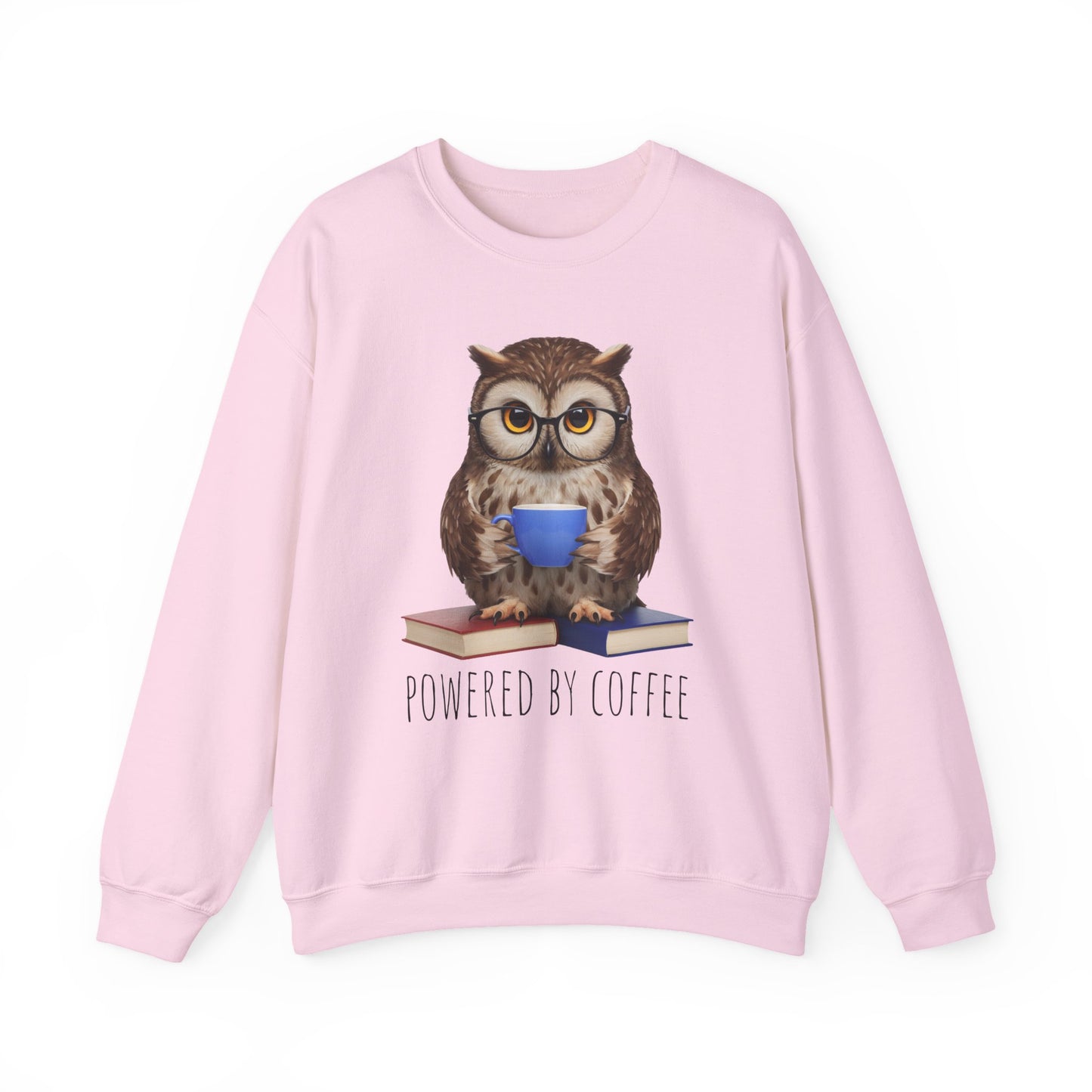 Pink sweatshirt with an owl graphic and 'Powered by Coffee' text on a white background