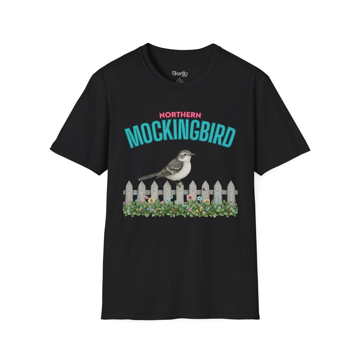 A black t-shirt with a graphic print featuring the text 'NORTHERN MOCKINGBIRD' in teal and pink, an illustration of a mockingbird perched on a white picket fence with green foliage, with white background.