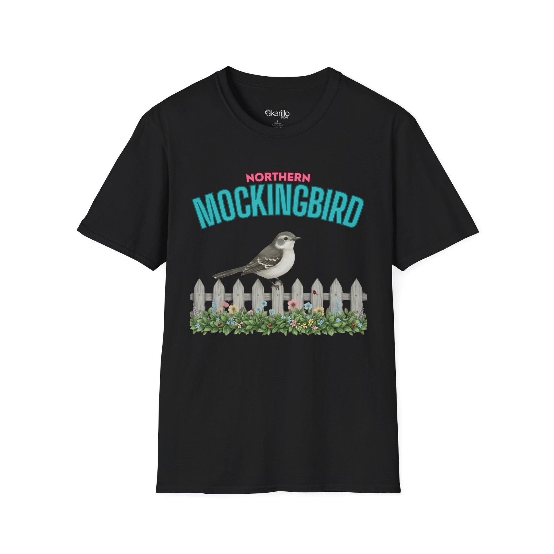 A black t-shirt with a graphic print featuring the text 'NORTHERN MOCKINGBIRD' in teal and pink, an illustration of a mockingbird perched on a white picket fence with green foliage, with white background.