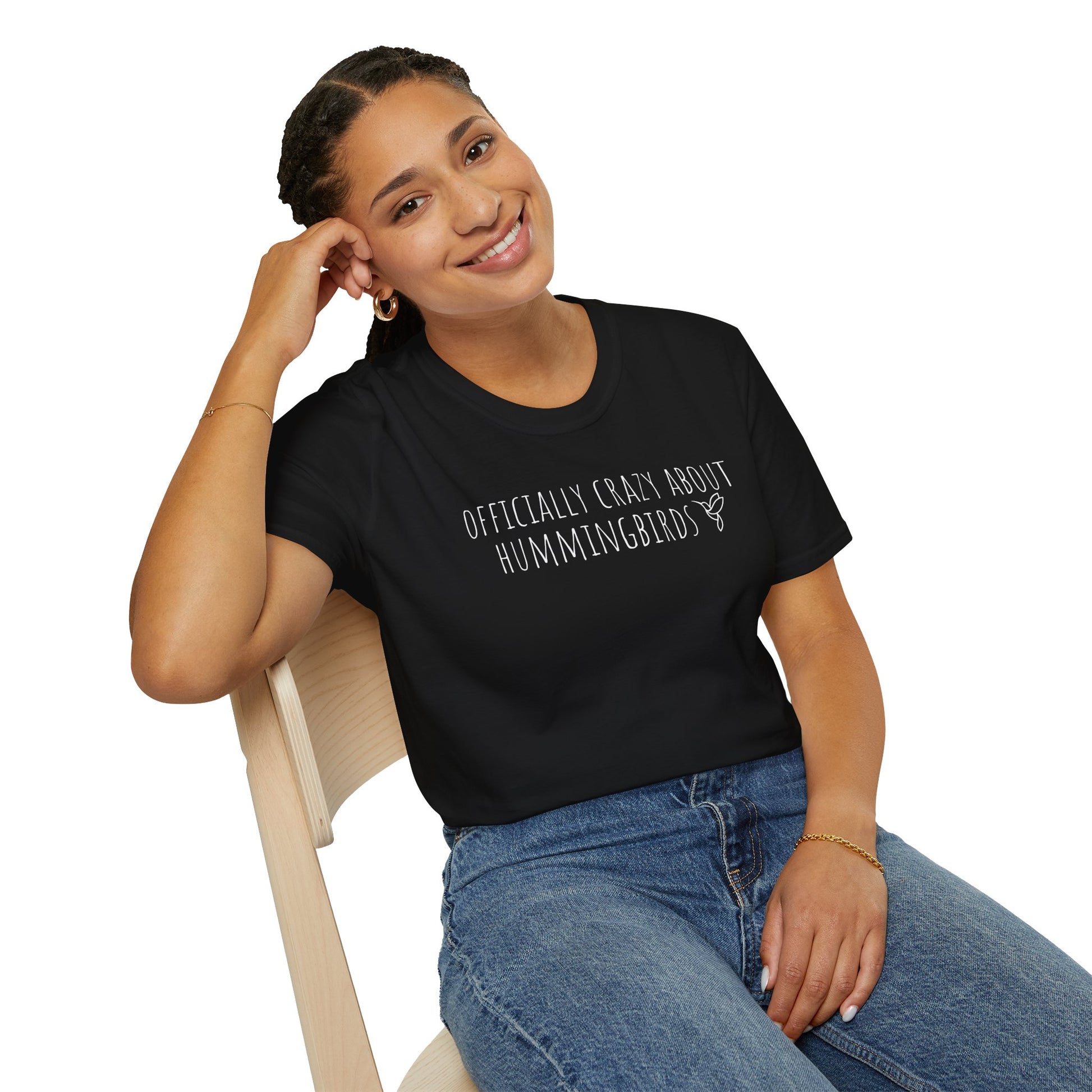 girl wearing black t-shirt with text 'Officially crazy about hummingbirds' on a white background