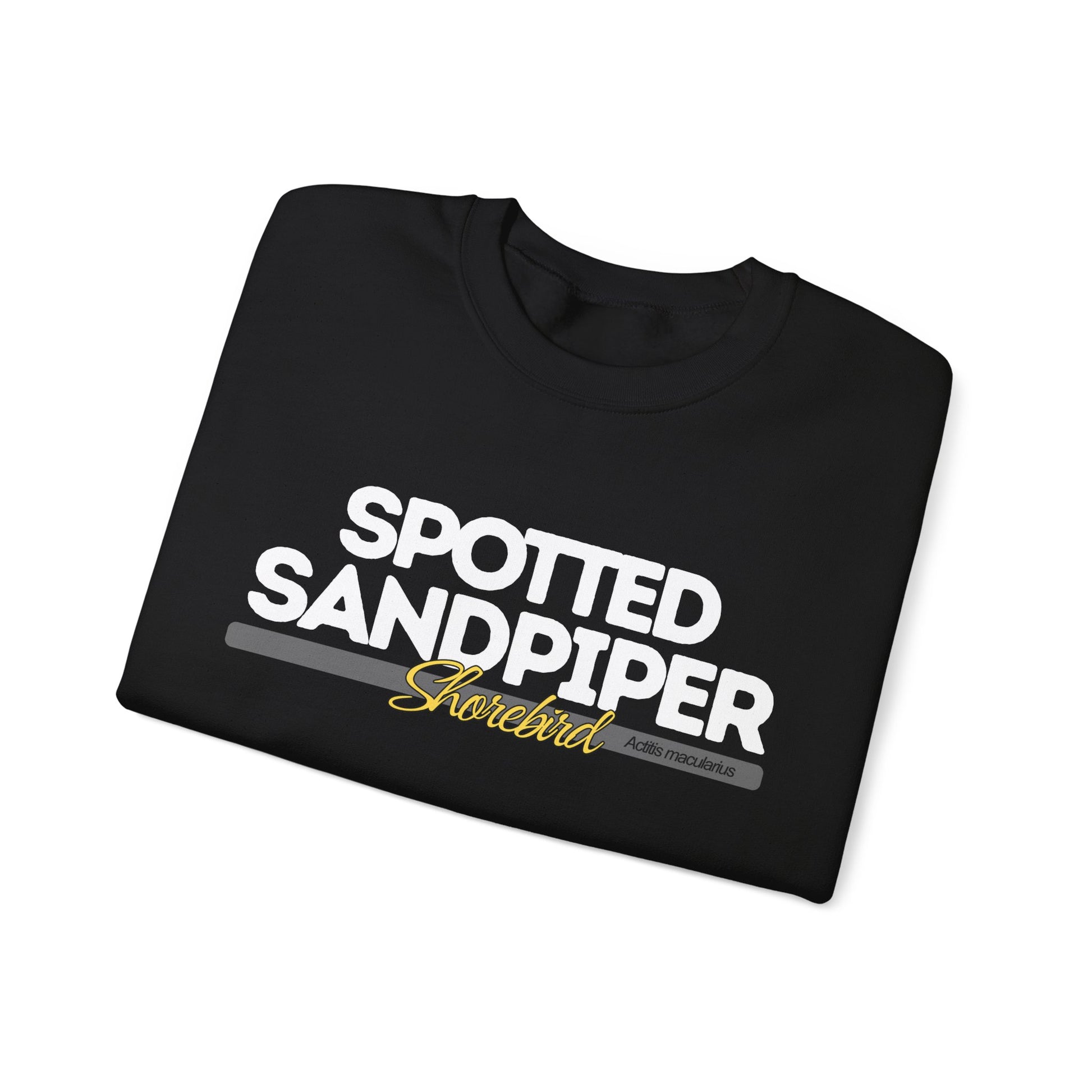 Folded lack t-shirt with 'Spotted Sandpiper Shorebird' text on a white background