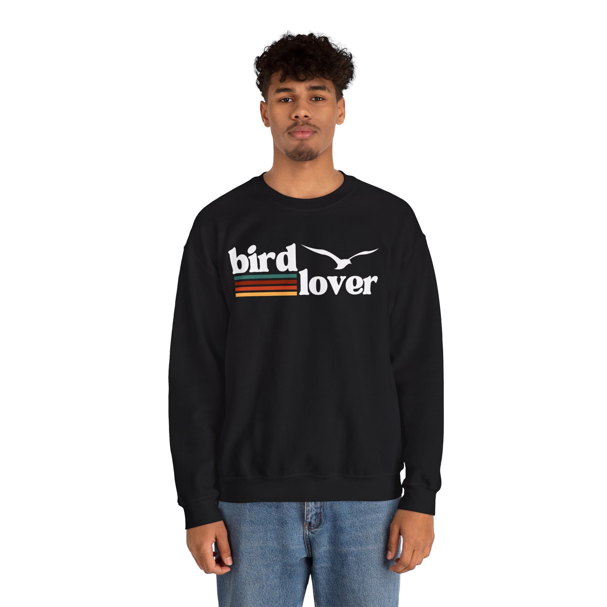 Person wearing black sweatshirt with 'bird lover' text and bird graphic, colored lines, on a white background