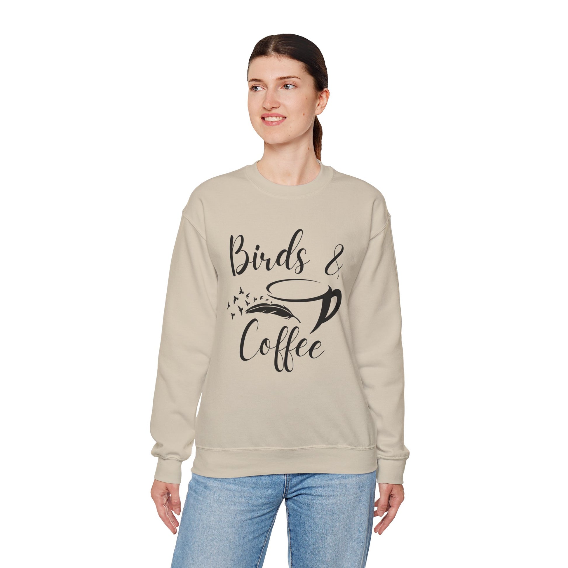 Woman wearing a beige sweatshirt with 'Birds & Coffee' text on a white background