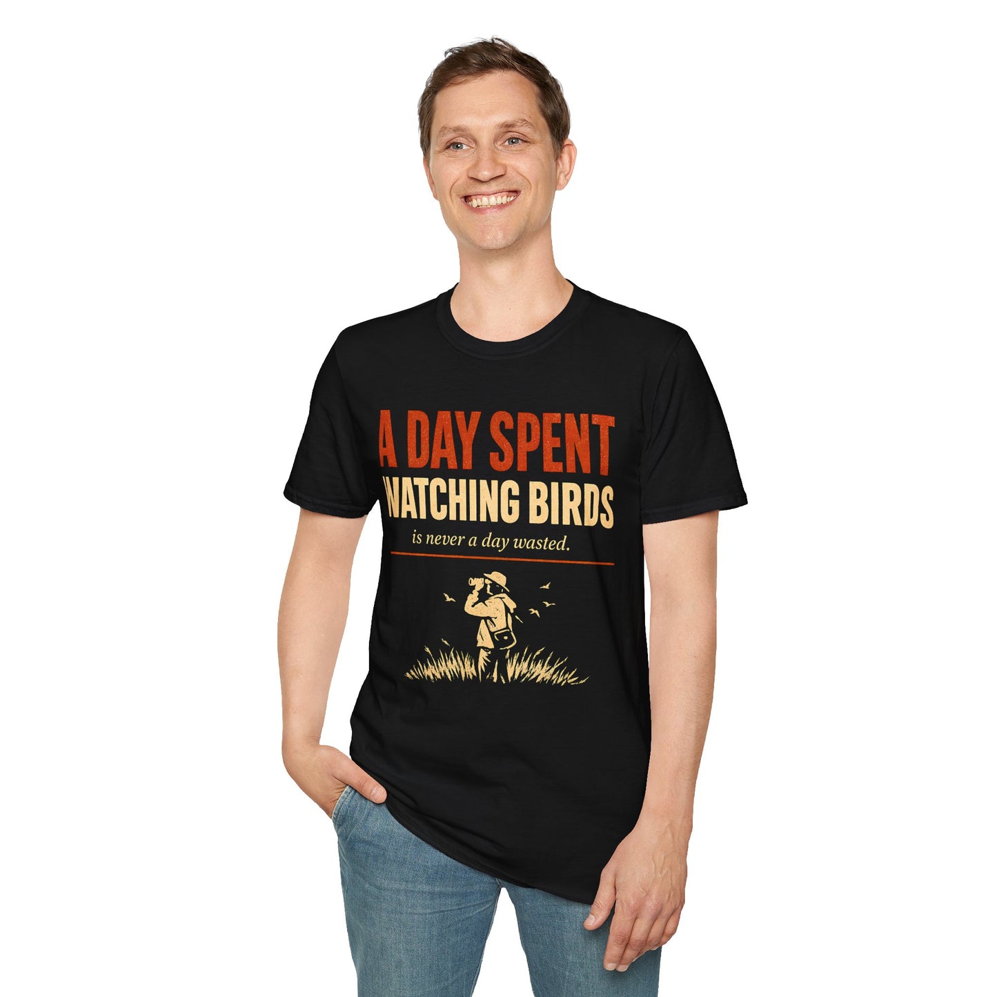 Person wearing black t-shirt with text "a day spent watching birds" and birdwatcher person graphic with white background.