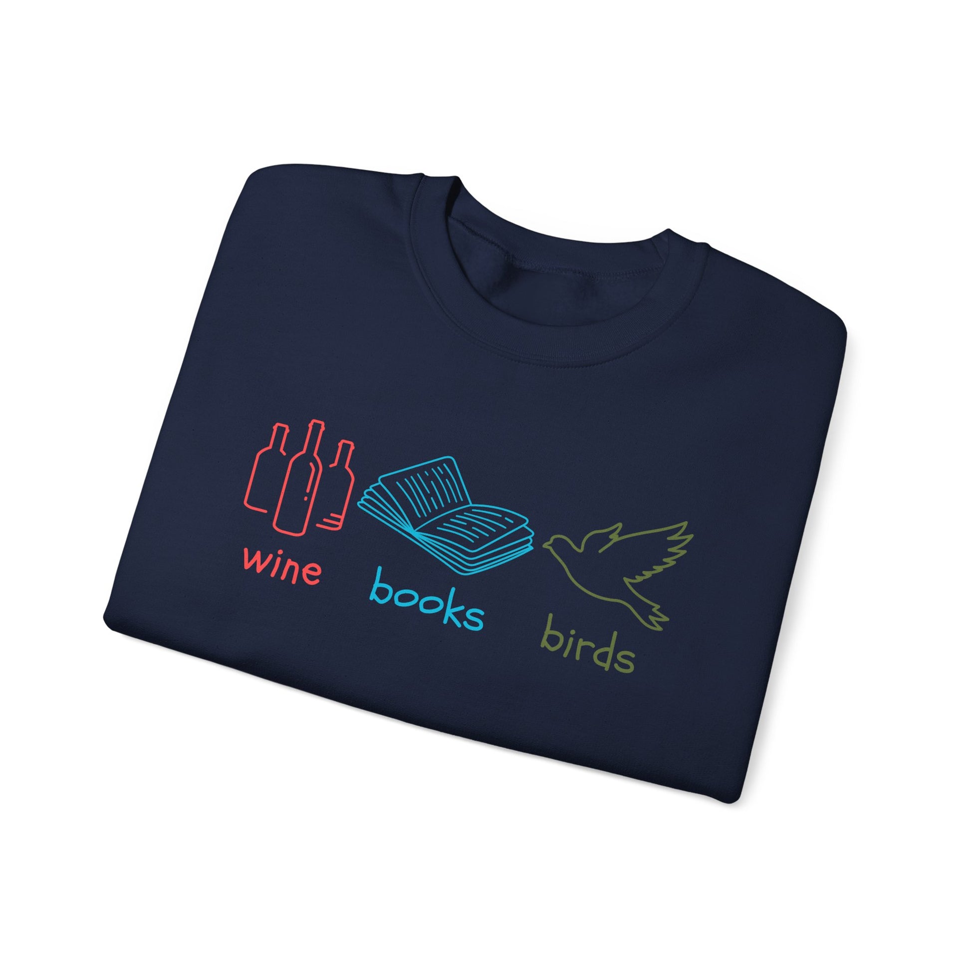 Folded navy blue t-shirt with wine, bokks, birds text on a white background