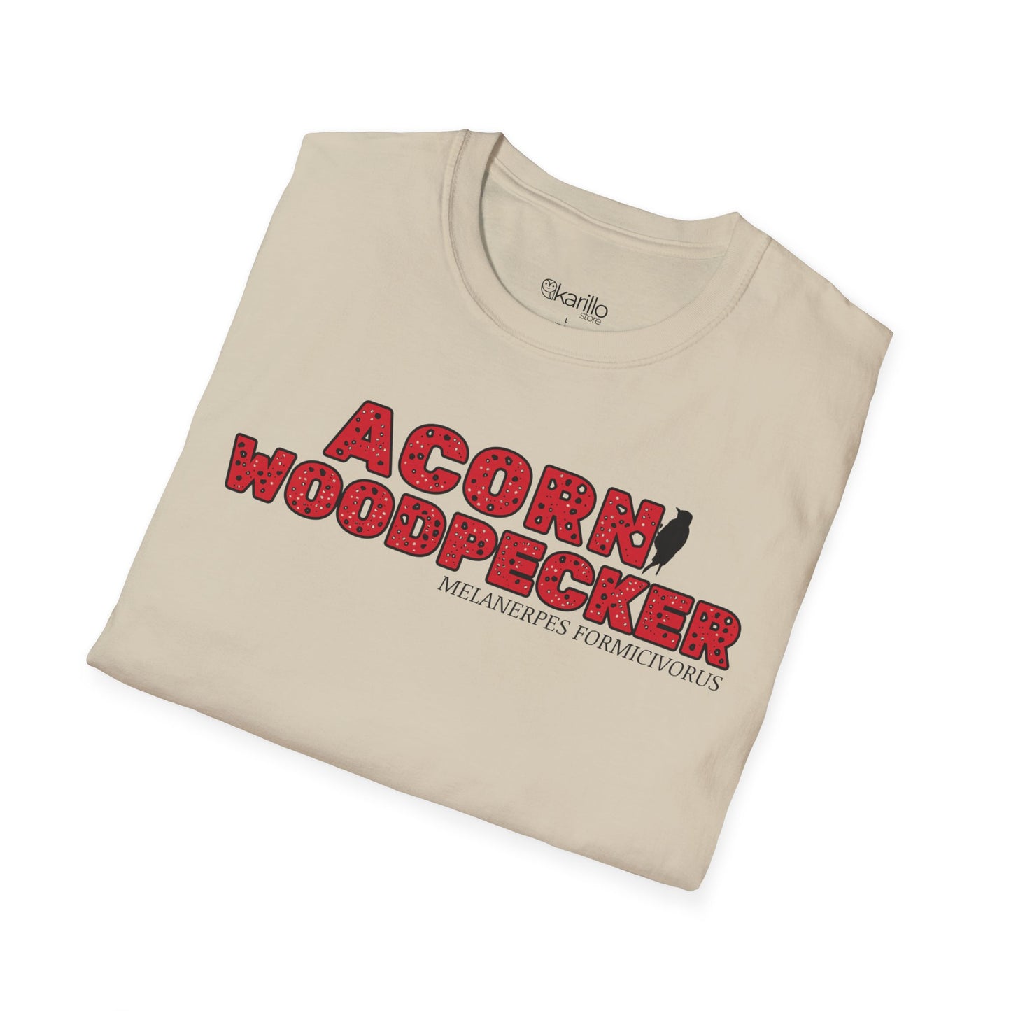 Folded Beige t-shirt with "acorn woodpecker bird" text on a white background