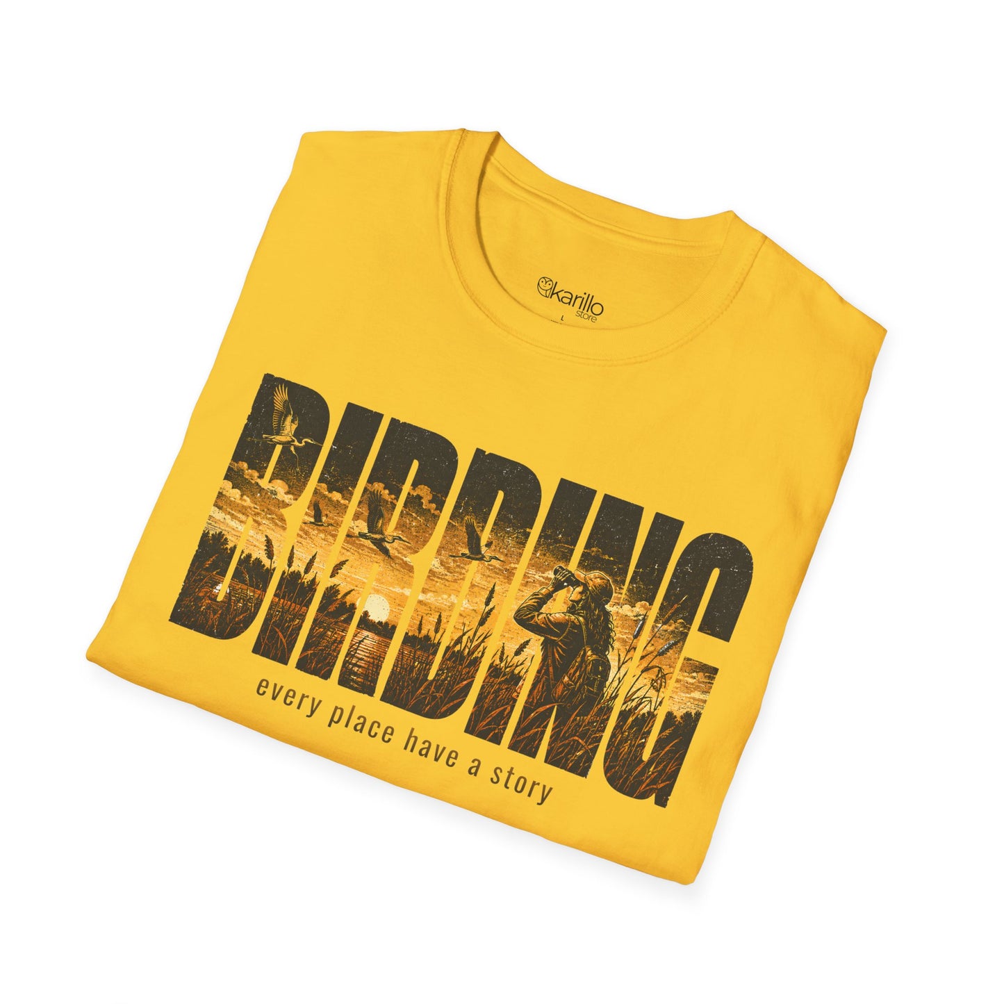 Folded yellow t-shirt with Birding text sunset scenic with white background