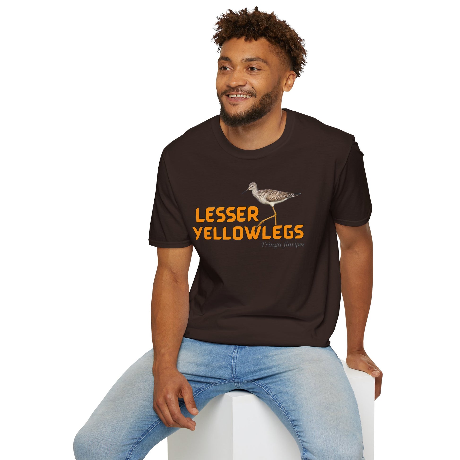 man wearing brown t-shirt with 'lesser yellowlegs' text and bird image on a white background