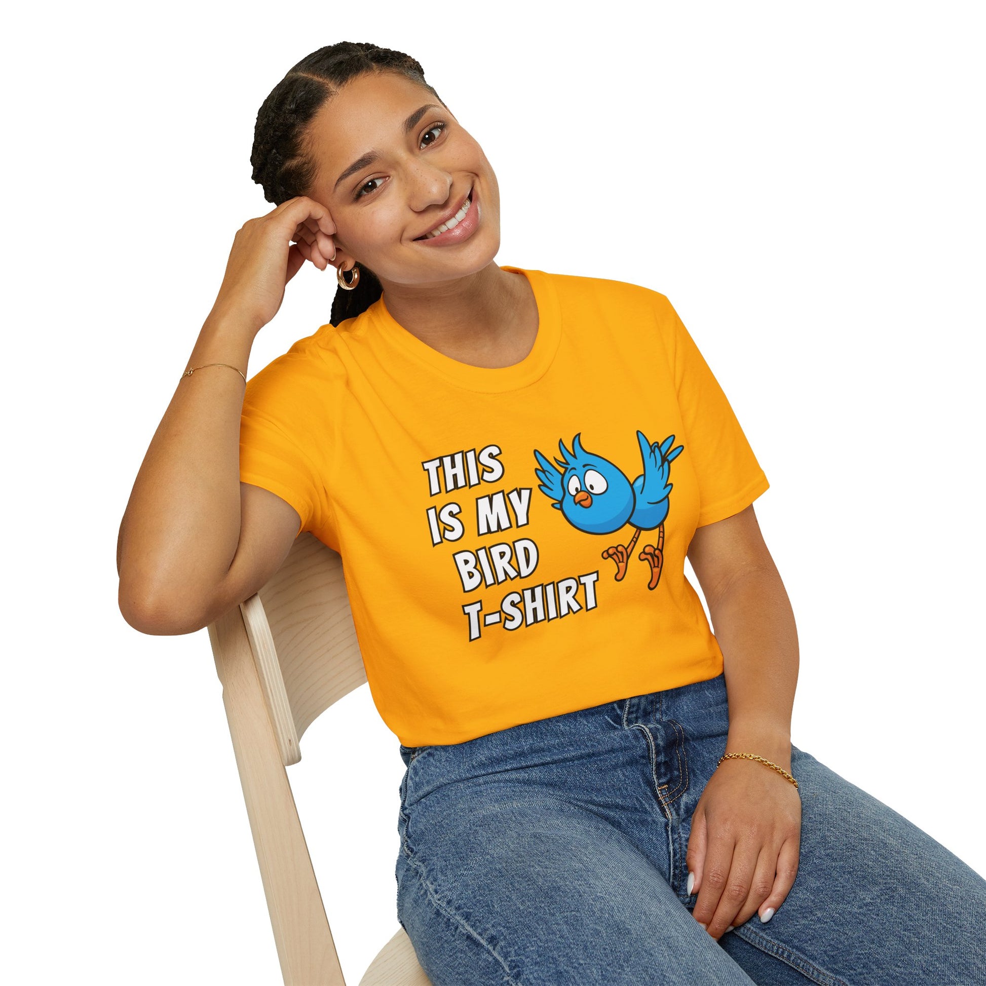 Girl wearing yellow t-shirt with text "this is my bird t-shirt" with blue graphic bird on whithe background.
