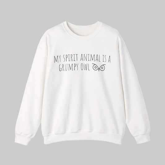 White sweatshirt with text 'My Spirit Animal is a Grumpy Owl' on a light gray background