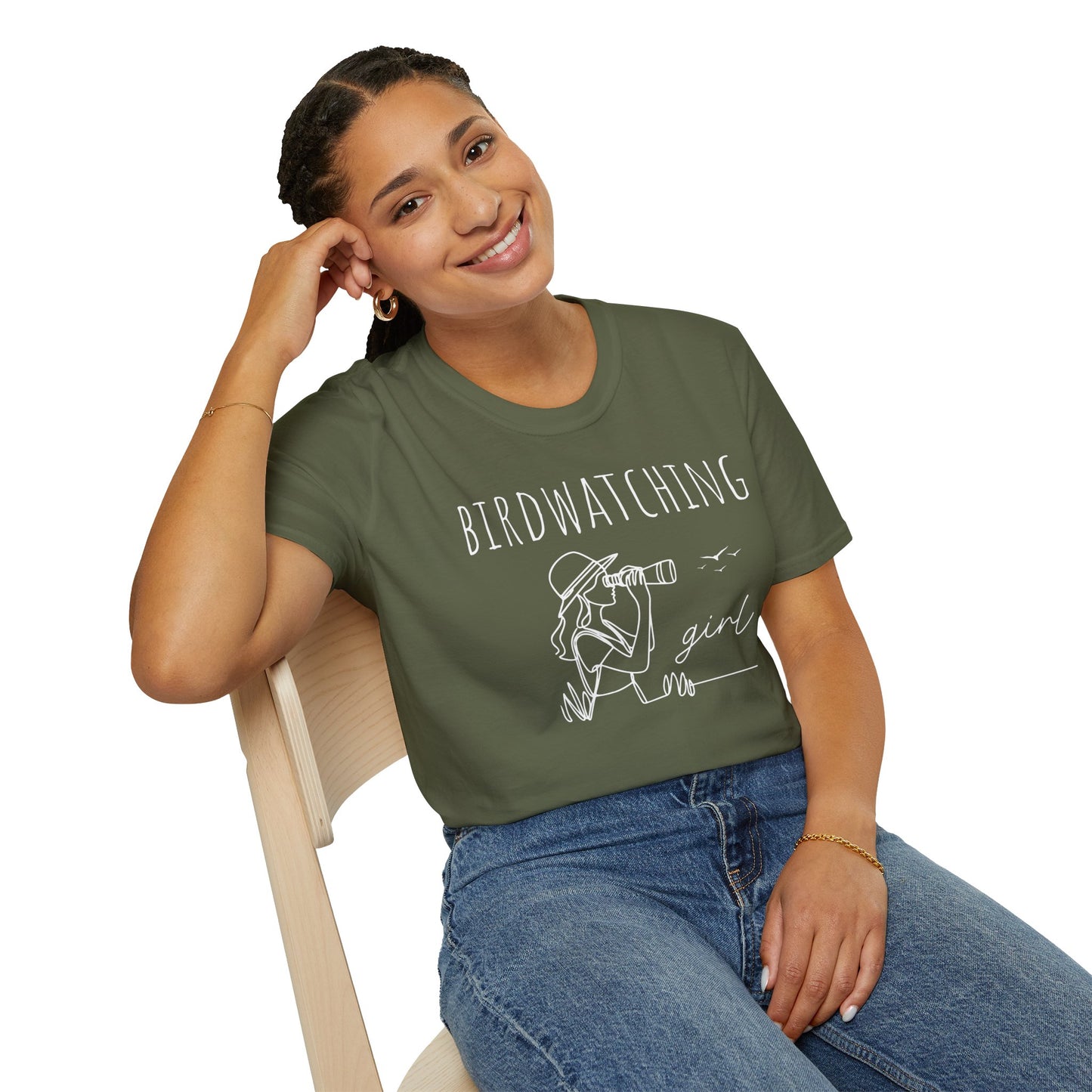 Woman wearing a "Birdwatching Girl" T-shirt with an outlined graphic of a girl spotting a bird using binoculars